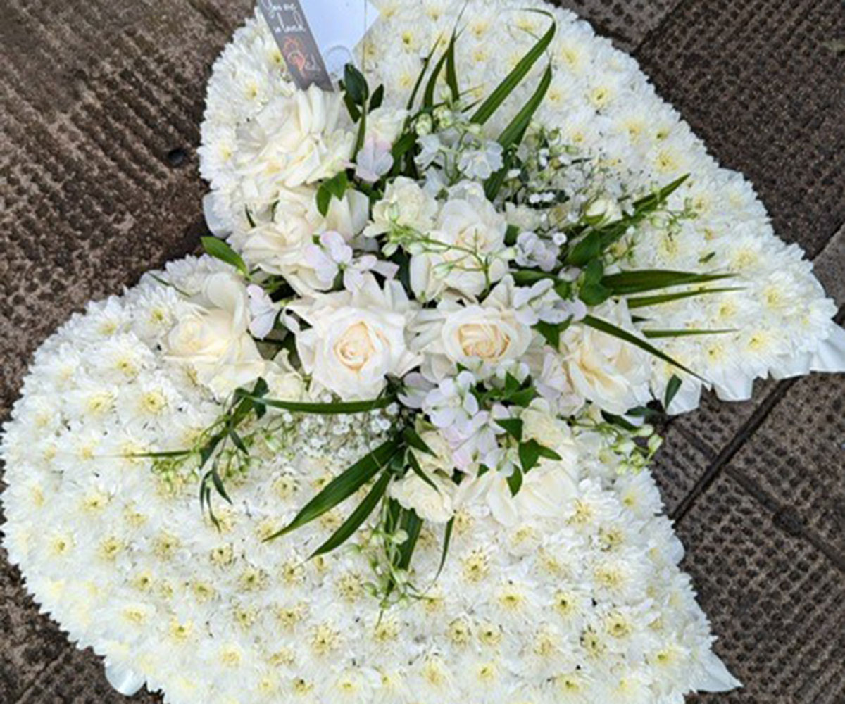 Personalised funeral tribute created by Petals Flowers