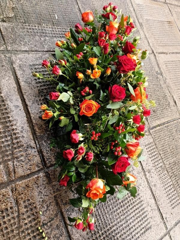Red and Orange Casket Spray